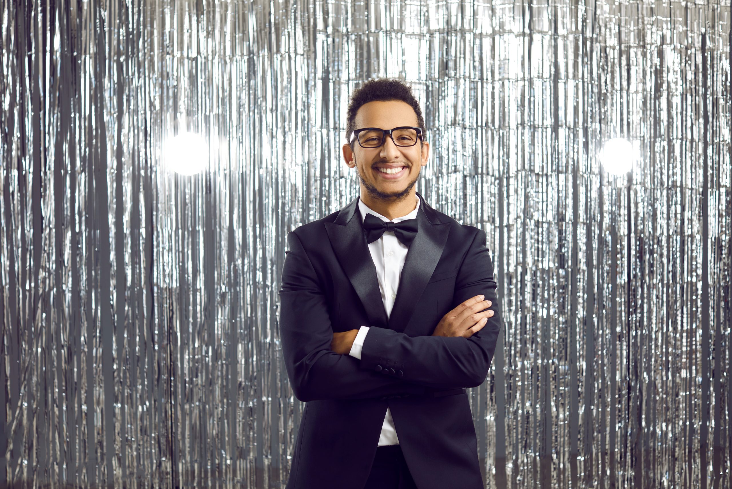Elegant black tuxedo ensemble for outdoor evening weddings